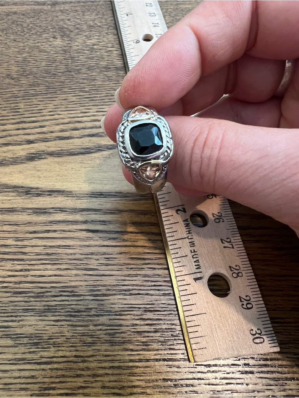 Beautiful silver ring with black and citrine colored stones inlayed